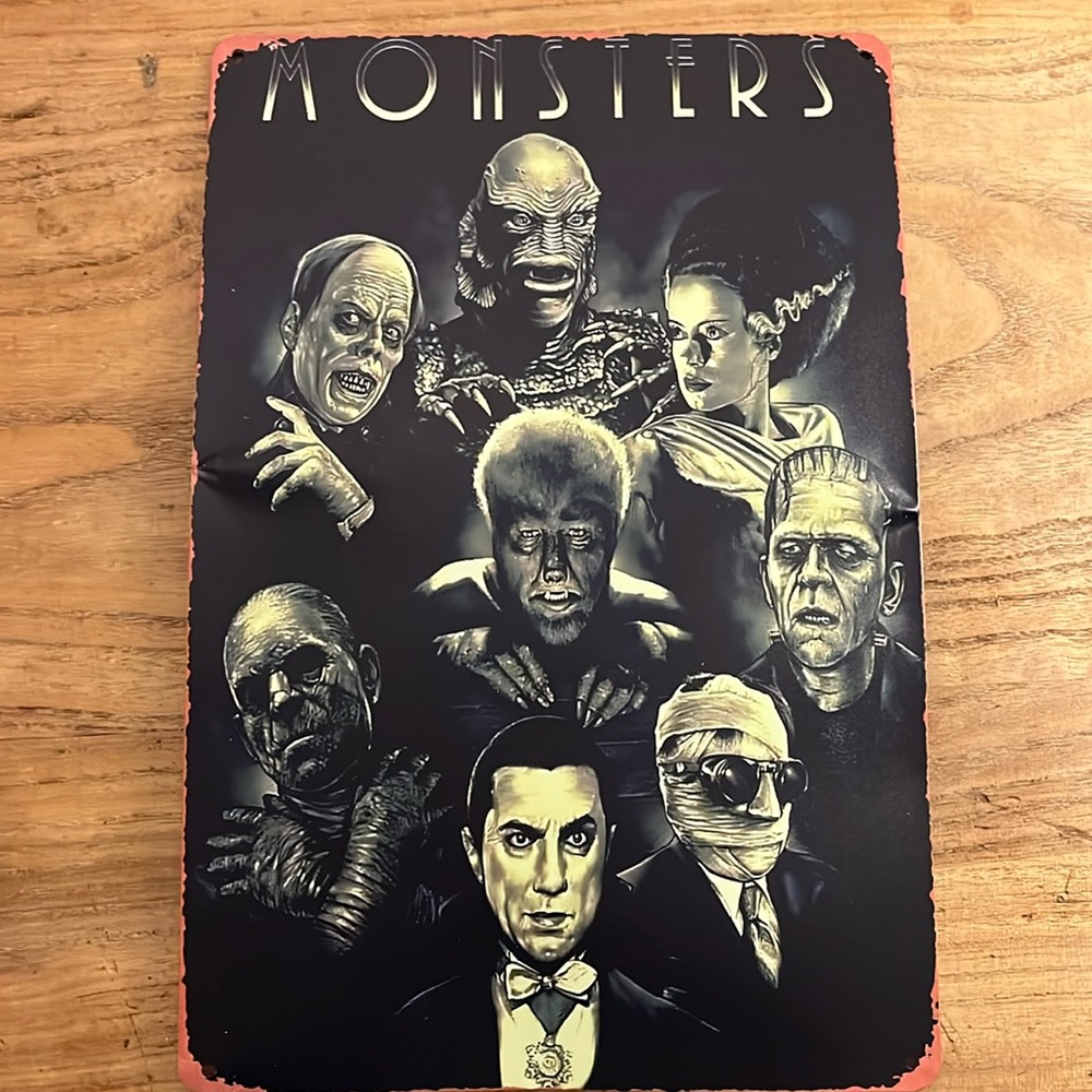 Universal horror monsters metal sign 8x12 (a little bent)